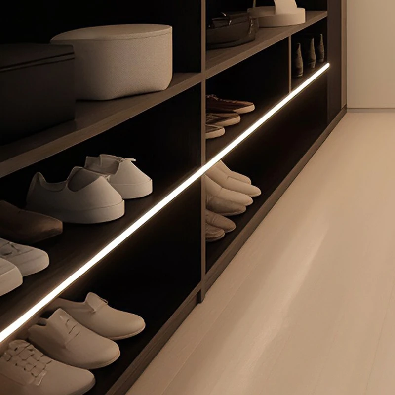 Minimalist black-and-white walk-in closet (5)