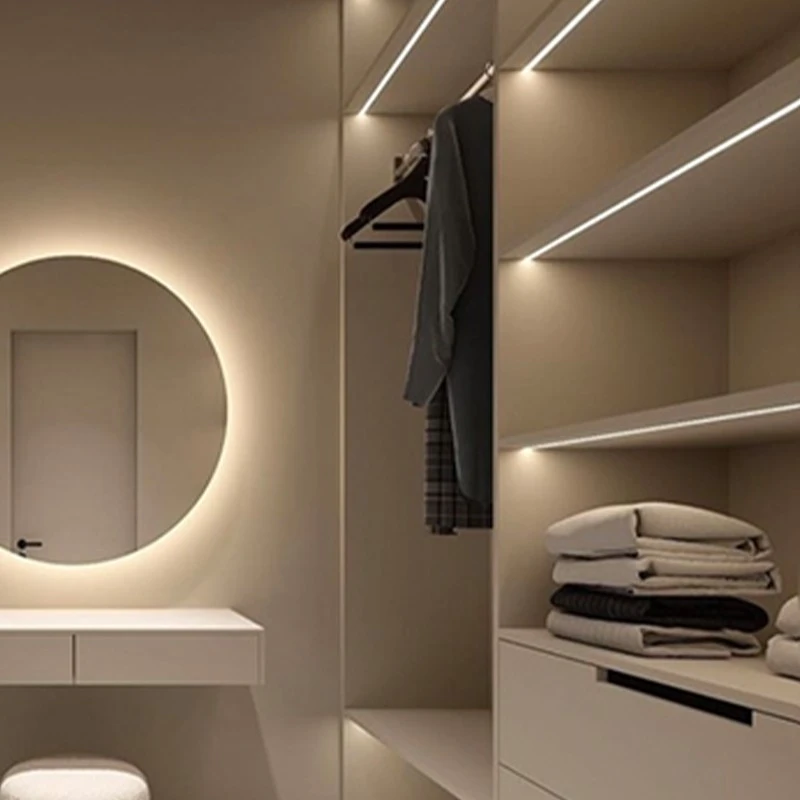 Open-concept minimalist style walk-in closet (2)